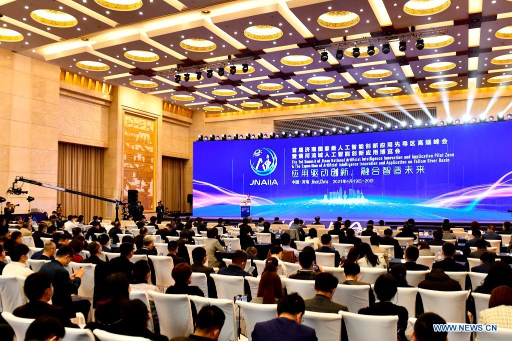 Photo taken on April 19, 2021 shows the opening ceremony of the 1st Summit of Jinan National Artificial Intelligence Innovation and Application (JNAIIA) Pilot Zone & the Exposition of Artificial Intelligence Innovation and Application on Yellow River Basin in Jinan, east China