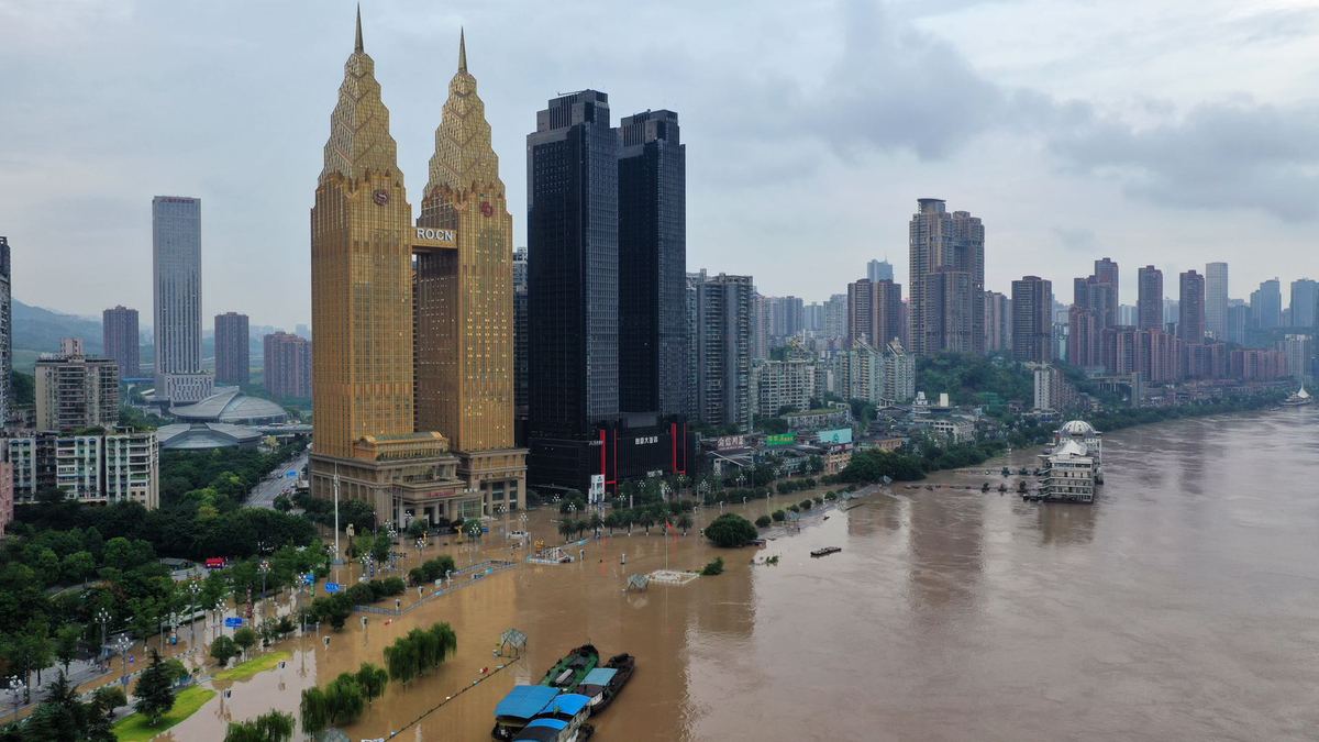 An aerial view of Nanbin Road, Chongqing, hit by severe flooding due to recent heavy downpours in the upper reaches of Yangtze and Jialing rivers on Tuesday. The top level emergency response for floods was triggered. [Photo by Guo Xu/for chinadaily.com.cn]Chongqing is facing its biggest potential flood since 1981 as its flood control and drought relief headquarters upgraded the alert level from Level II to Level I, the most serious of China