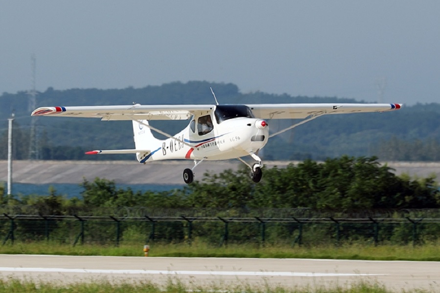 An AG50 light-sport aircraft takes off from Zhanghe airport for its maiden flight in Jingmen, Central China