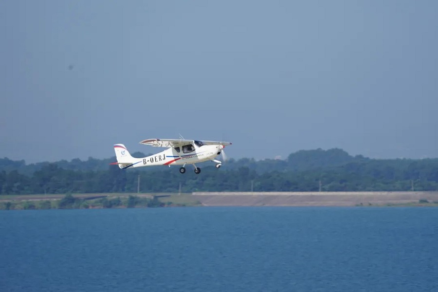 An AG50 light-sport aircraft takes off from Zhanghe airport for its maiden flight in Jingmen, Central China