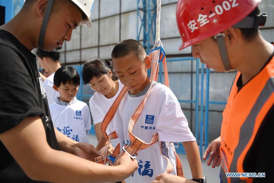 Parents and children attend a parent-child activity in Anning District of Lanzhou, northwest China