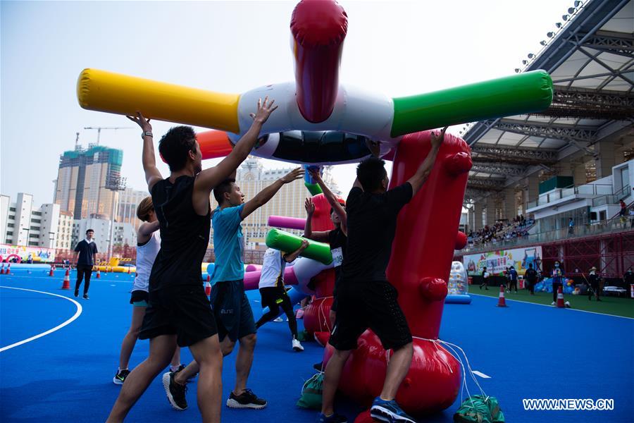 Competitors participate in a festival competition in Macao, south China, Aug. 30, 2020. (Xinhua/Cheong Kam Ka)