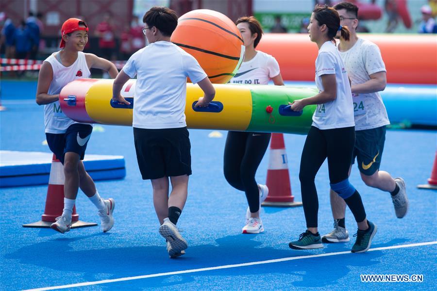 Competitors participate in a festival competition in Macao, south China, Aug. 30, 2020. (Xinhua/Cheong Kam Ka)