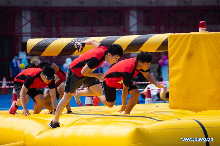 Competitors participate in a festival competition in Macao, south China, Aug. 30, 2020. (Xinhua/Cheong Kam Ka)