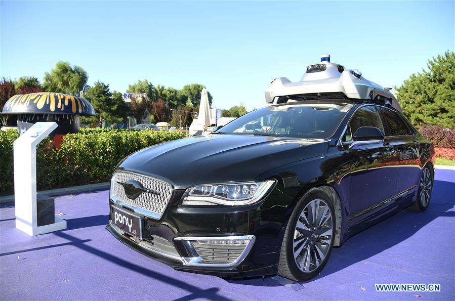 Photo taken on Sept. 17, 2020 shows an auto-pilot vehicle exhibited during the 2020 Zhongguancun Forum (ZGC Forum) in Beijing, capital of China. During the forum held from Sept. 17 to 20, more than 50 activities will be organized including conferences, exhibitions, transactions, and releases, with online livestream channels available to the public. The 23rd China Beijing International High-tech Expo is held together with the ZGC Forum, showcasing the latest technological achievements to the world. (Xinhua/Ren Chao)
