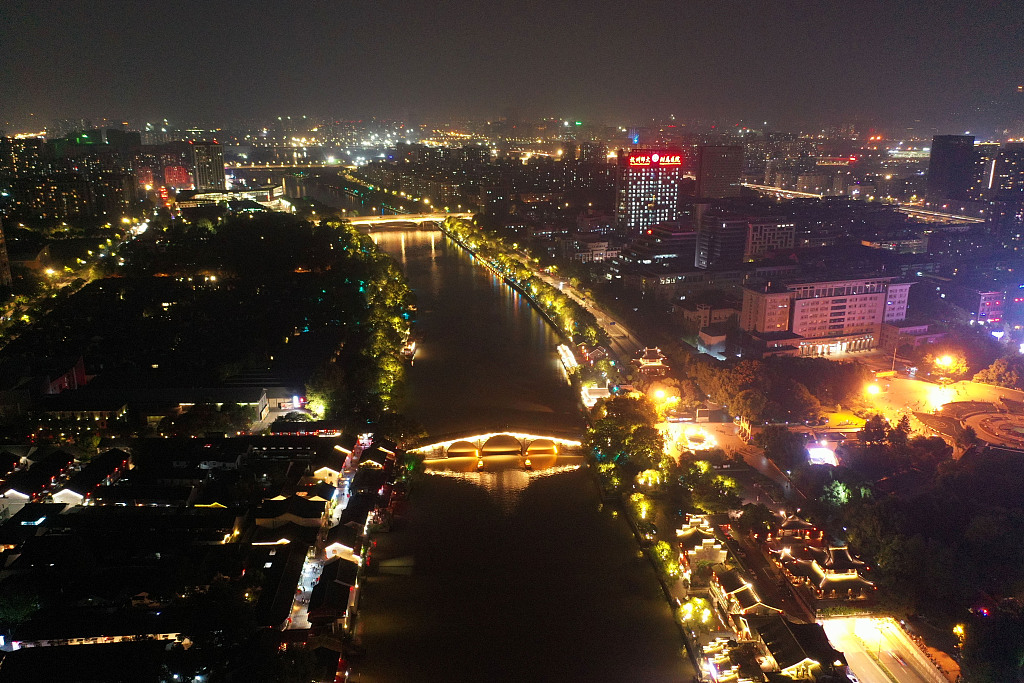 Gongchen Bridge, which was built during the late Ming Dynasty (1368-1644), is a famous cultural landmark crossing over the thousand-year-old Grand Canal, which ends in Hangzhou, Zhejiang province. The bridge and its surroundings offer a magnificent view at night. [Photo/VCG]