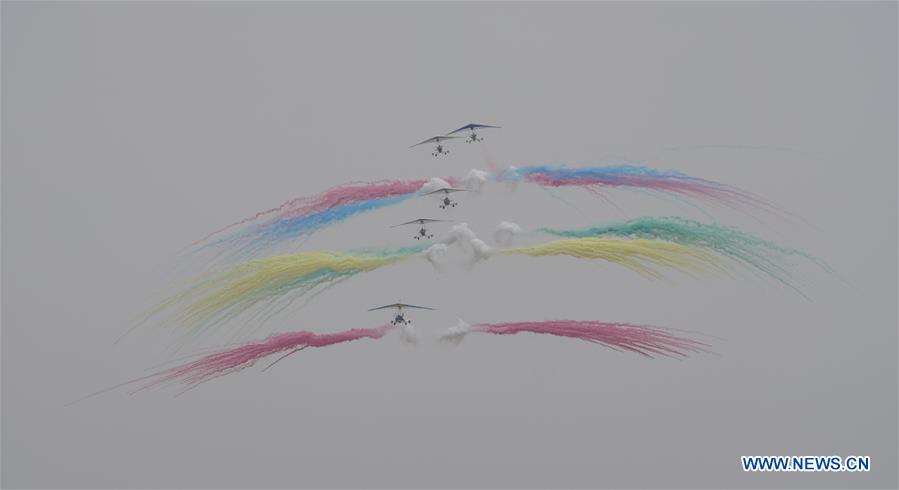 An aerobatic team performs during the 2020 Nanchang Flight Convention at Yaohu Airport in Nanchang, capital of east China