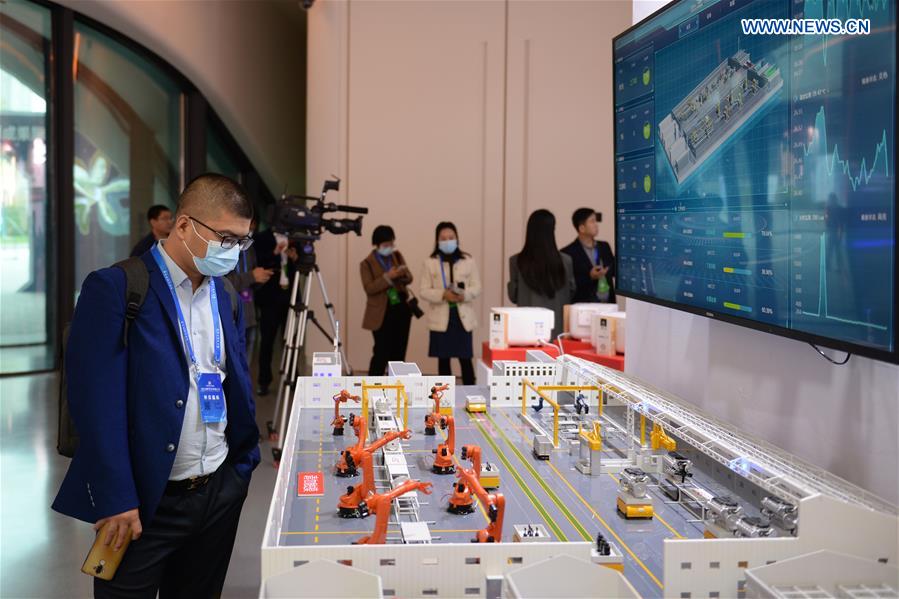 Guests visit an exhibition during the 2020 World Computer Congress in Changsha, capital of central China