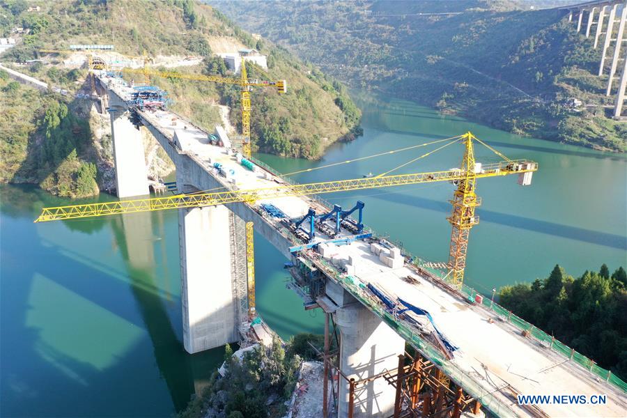 Photo taken on Nov. 8, 2020 shows the construction site of a highspeed railway bridge over Tangxi River in Yunyang Township in southwest China