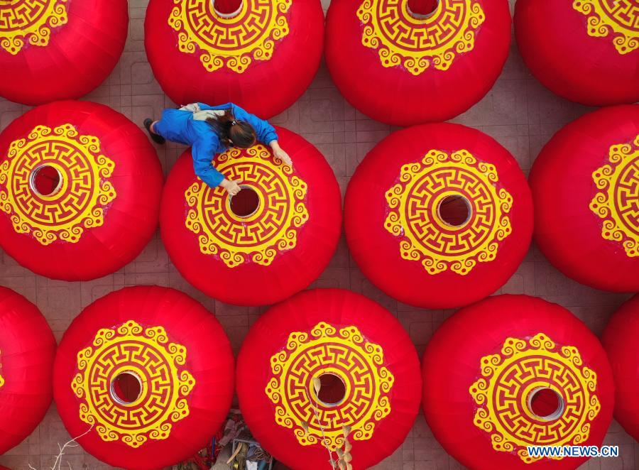 Aerial photo shows a villager airing red lanterns at Luozhuang Township of Xingtai City, north China