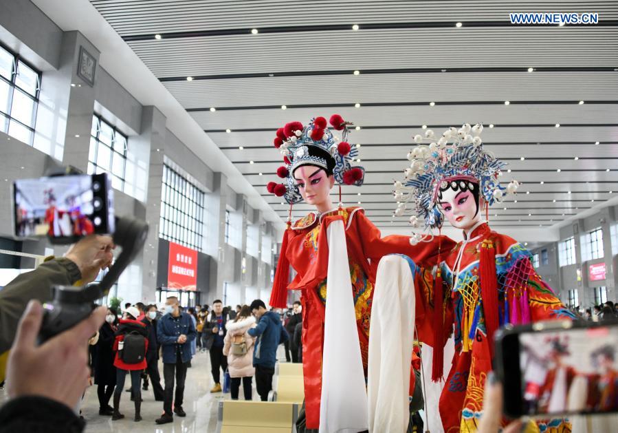 A puppet show is held in a waiting room before the inauguration of the Weifang-Laixi high-speed railway at the Pingdu Railway Station in Pingdu City, east China