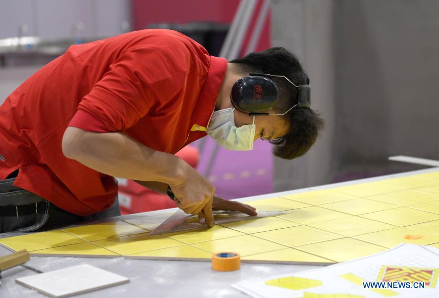 A contestant competes during the first vocational skills competition in Guangzhou, south China