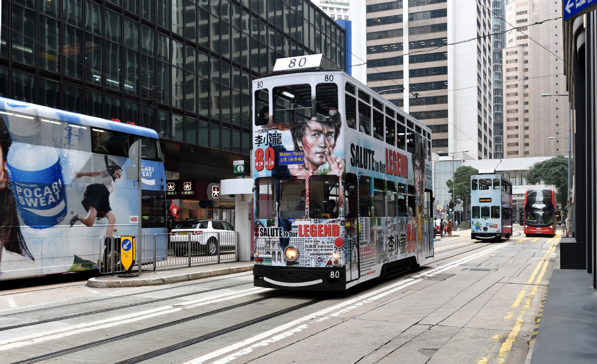 Tramcars in Hong Kong with drawings of Bruce Lee are used to commemorate the kung fu master