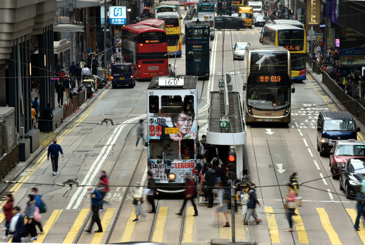 Tramcars in Hong Kong with drawings of Bruce Lee are used to commemorate the kung fu master