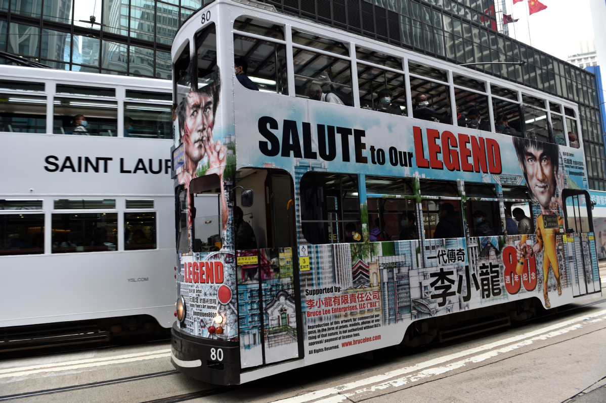 Tramcars in Hong Kong with drawings of Bruce Lee are used to commemorate the kung fu master