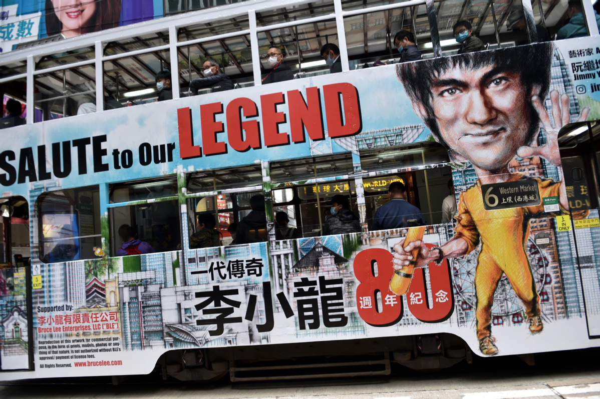 Tramcars in Hong Kong with drawings of Bruce Lee are used to commemorate the kung fu master