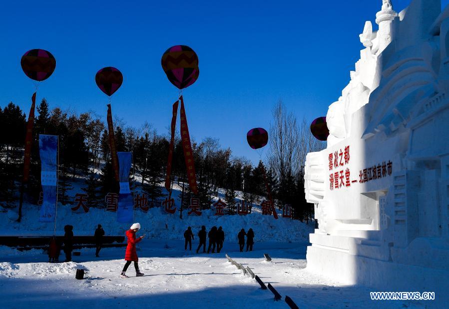 People visit the 26th International Rime Ice and Snow Festival (Jilin, China) in Jilin City, northeast China
