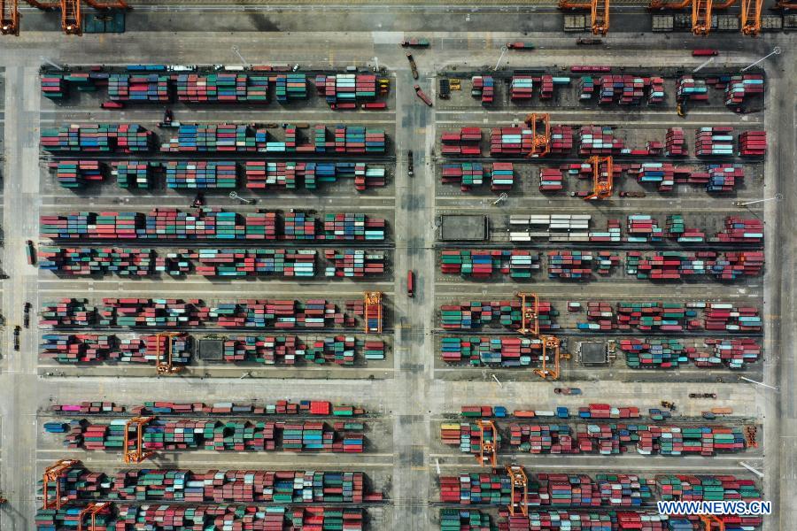 Aerial photo taken on Nov. 19, 2020 shows containers piled at the Qinzhou Port in south China