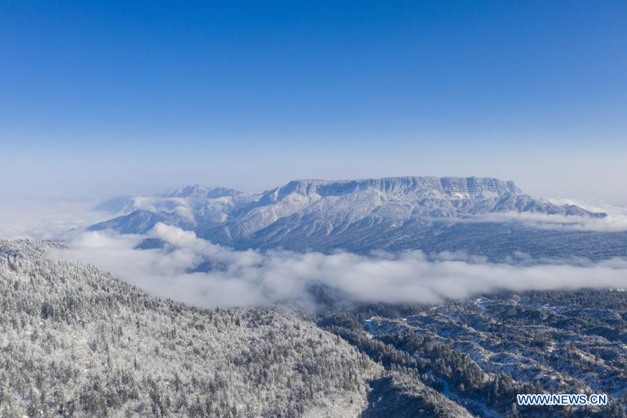 Aerial photo taken from the Longcanggou National Forest Park in Yingjing County on Jan. 2, 2021 shows the scenery of Wawu Mountain in southwest China