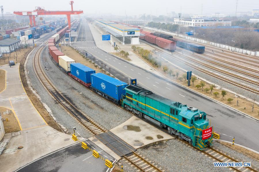 Aerial photo shows a China-Europe cargo train loaded with containers of electronic products and accessories of household appliances leaving for Russia