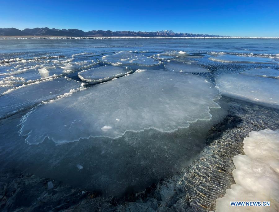 Cellphone photo taken on Jan. 29, 2021 shows the winter scenery of Nam Co Lake in southwest China