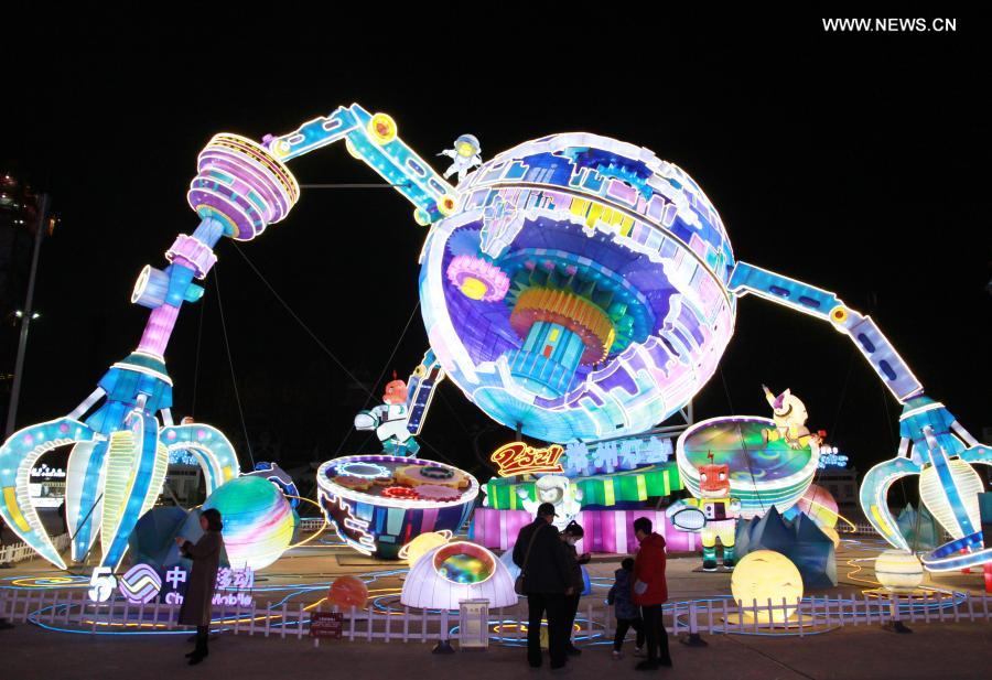 People view lanterns during a lantern show for the upcoming Chinese lantern festival, which falls on Feb. 26 this year, in Changzhou, east China