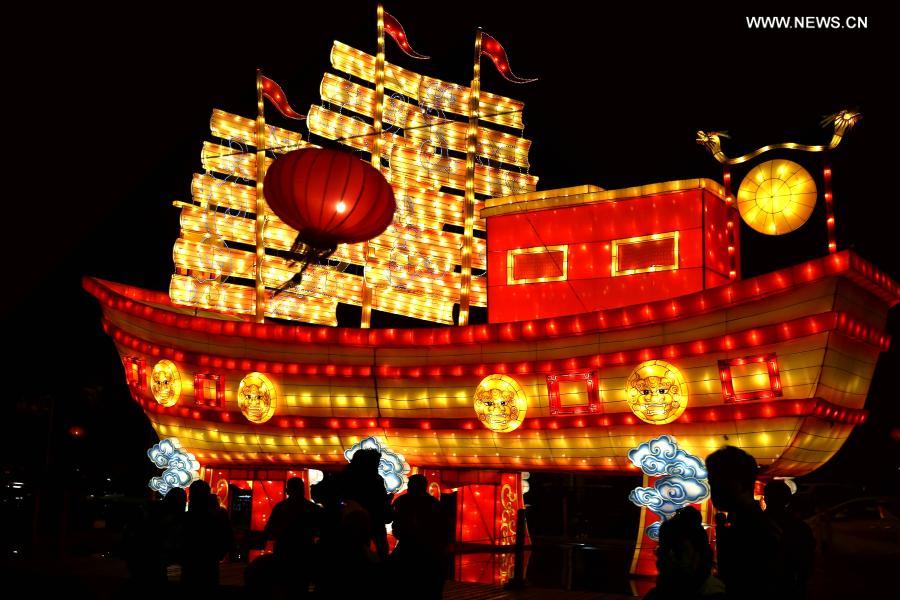 People view lanterns for the upcoming Chinese lantern festival, which falls on Feb. 26 this year, in Zhenjiang, east China