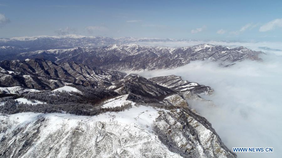 Aerial photo taken on March 1, 2021 shows the scenery of Tuoliang scenic area in Pingshan County, north China