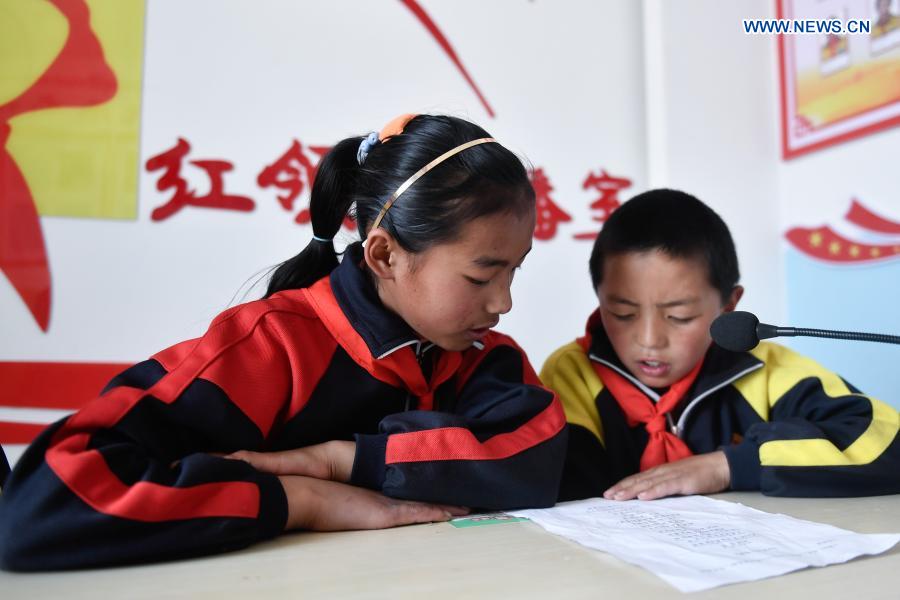 Students broadcast at a broadcasting room in a primary school in Gande County of Tibetan Autonomous Prefecture of Golog in northwest China