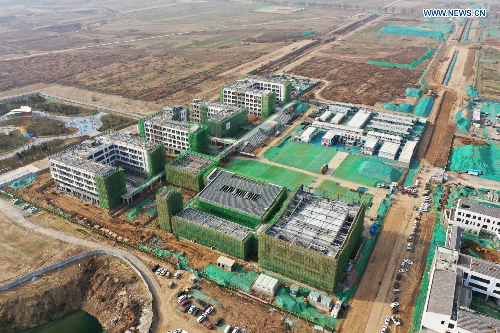 Aerial photo taken on March 31, 2021 shows the construction site of the Beijing No. 4 High School in Xiongan New Area, north China