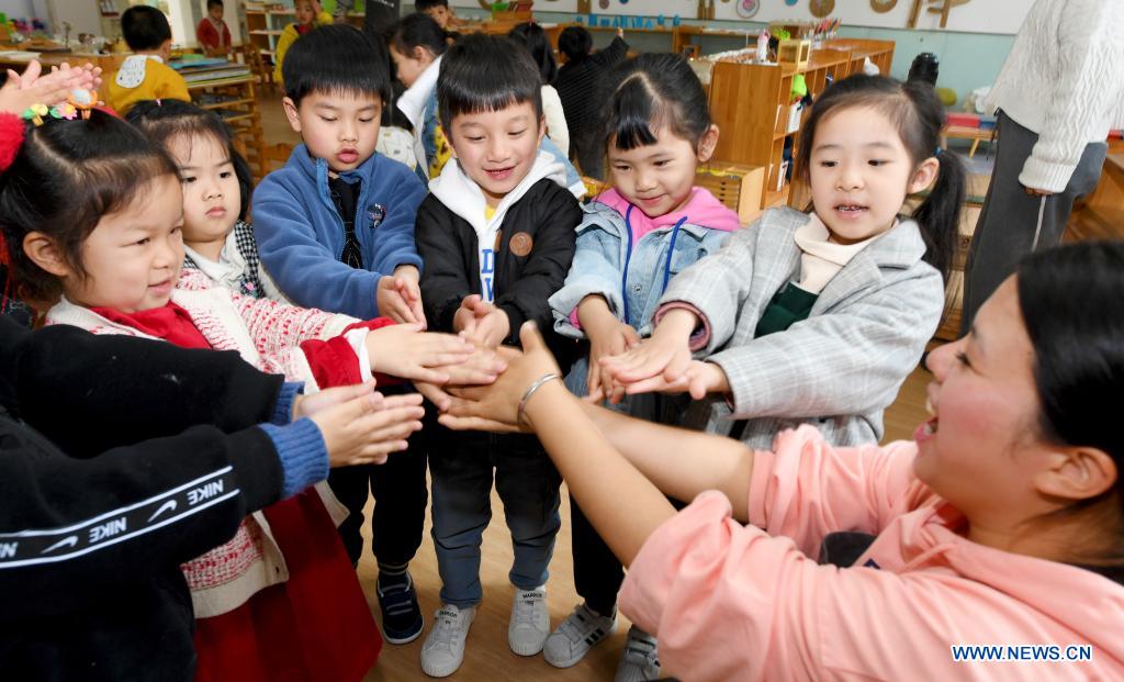 Children learn to wash hands at a kindergarten on the occasion of World Health Day in Taizhou City, east China