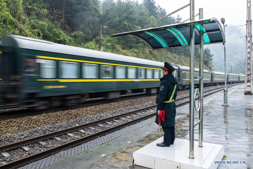 A train runs past Wanyan Station in central China